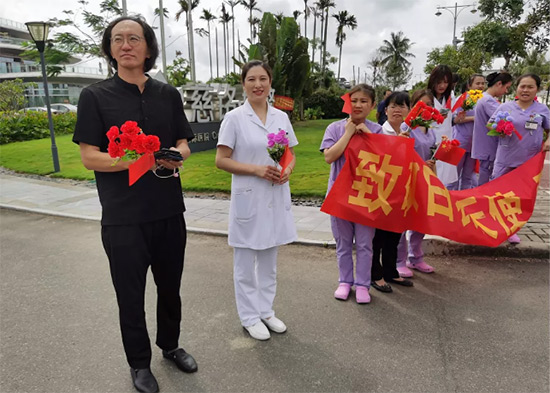 12胡波書記迎接在海南博鰲迎接醫療隊員凱旋.jpg